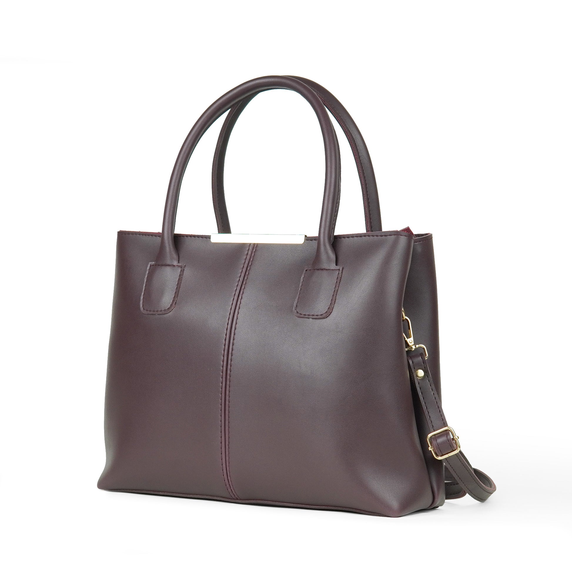 Maroon leather handbag with a strap on a white background