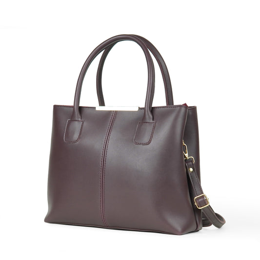 Maroon leather handbag with a strap on a white background
